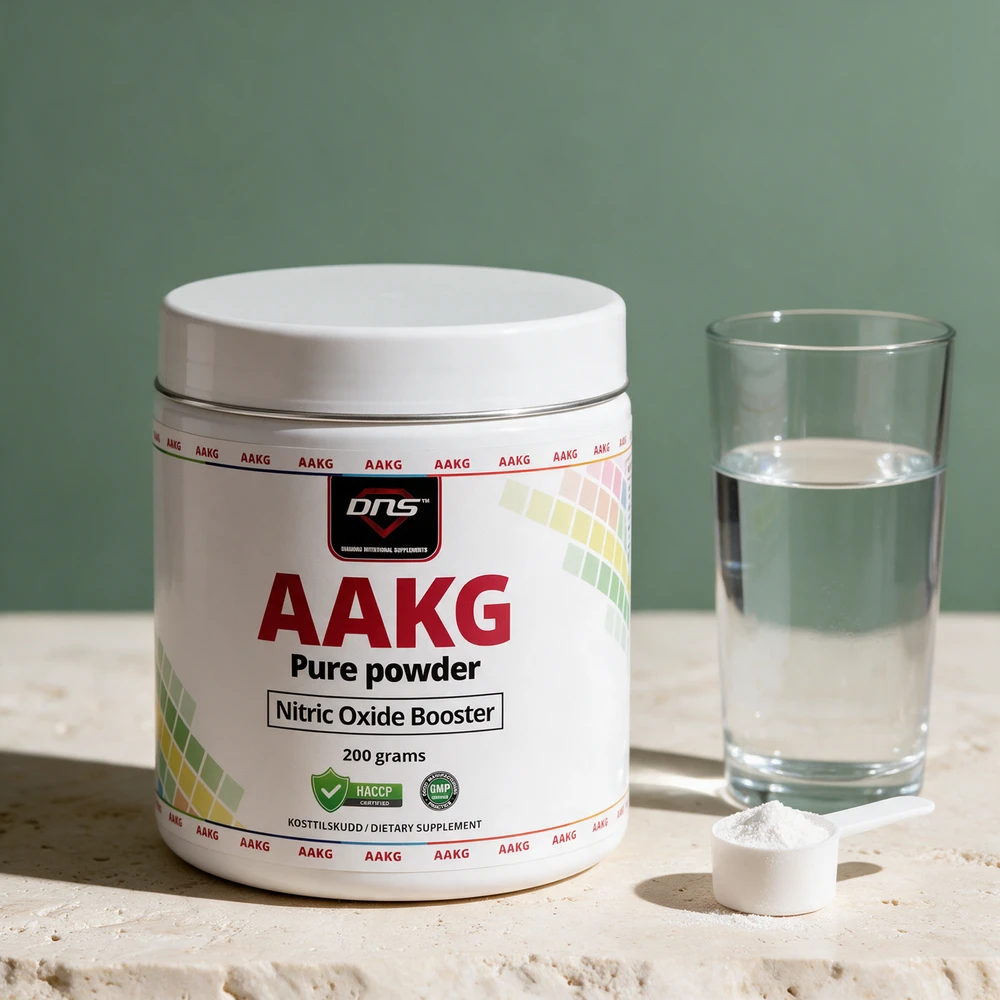 DNS AAKG Pure Powder med en skje pulver
