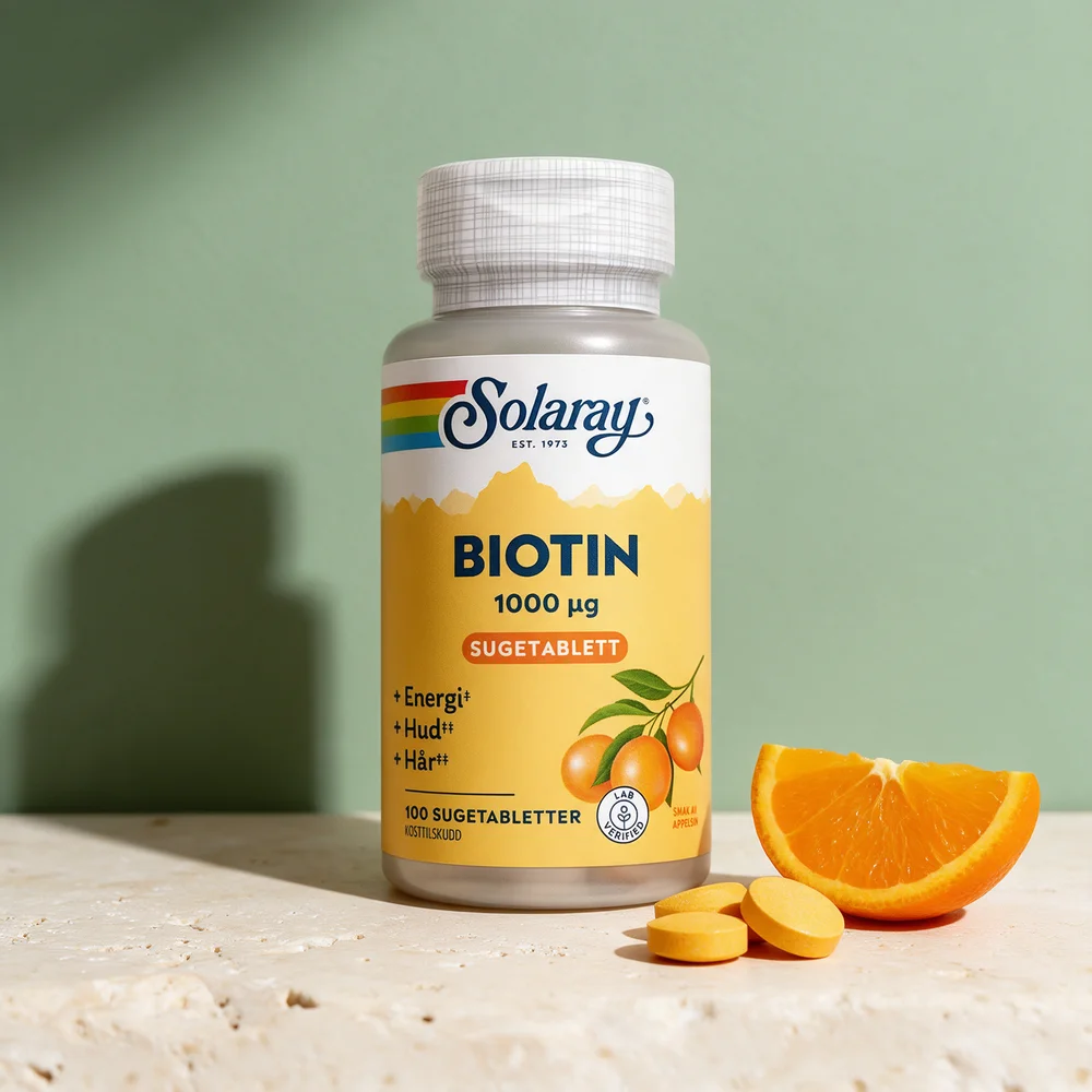 Solaray Biotin 1000 µg sugetabletter med gul-oransje sugetabletter og en appelsinbåt