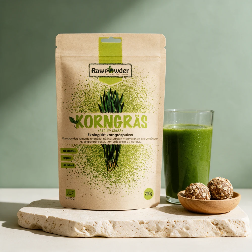 Rawpowder Byggress, kraftpapirpose med tegnede grønne gresstrå, merket «Ekologiskt korngräspulver» og «200g»