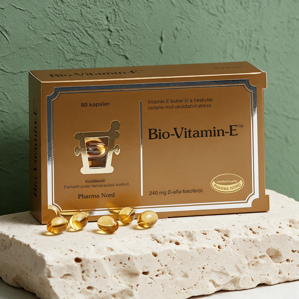 Pharma Nord Bio-Vitamin-E, eske med 60 kapsler og fem gjennomsiktige myke kapsler foran