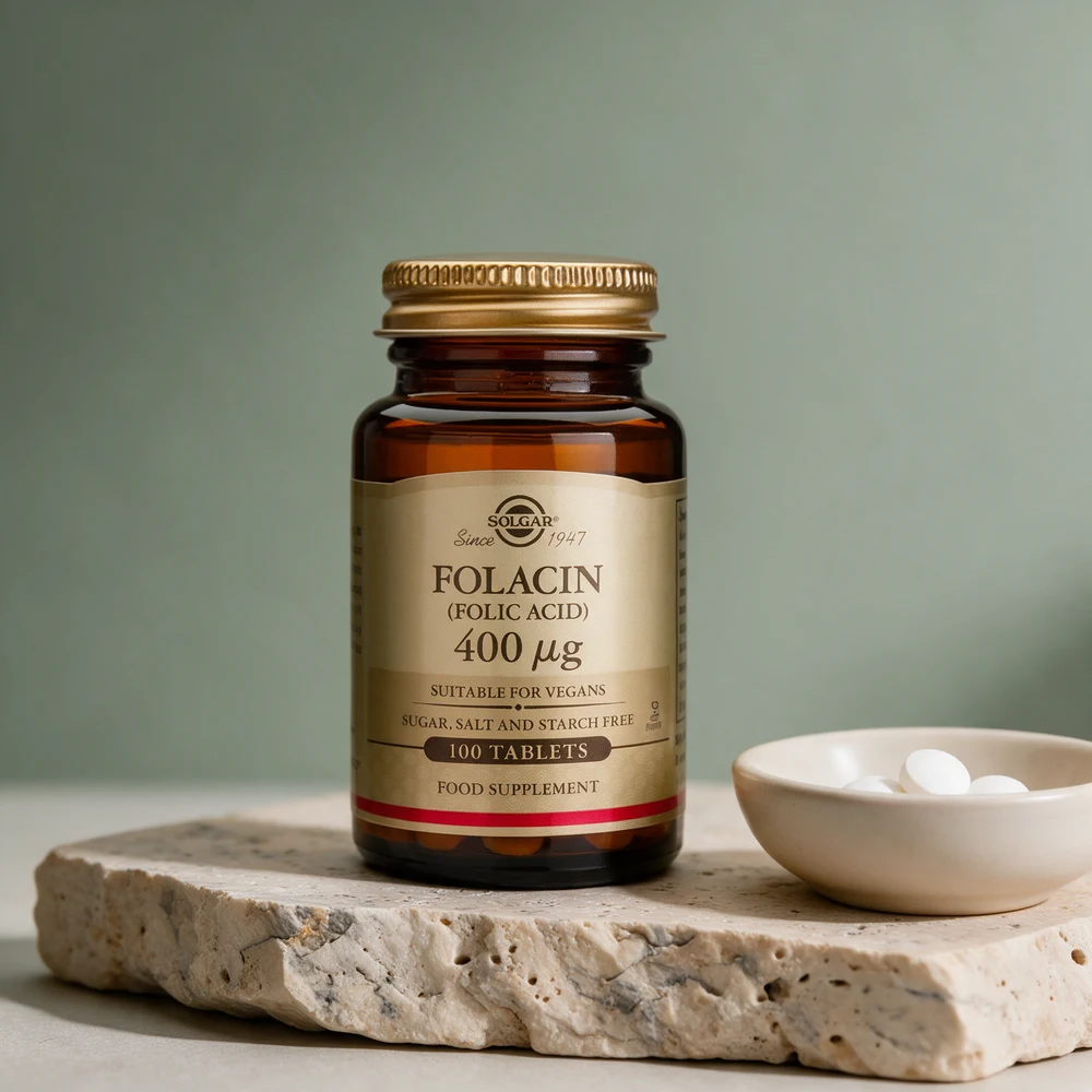 Solgar Folacin 400 µg, brun glassflaske med skrulokk av metall og etiketten «Folacin (Folic acid)»