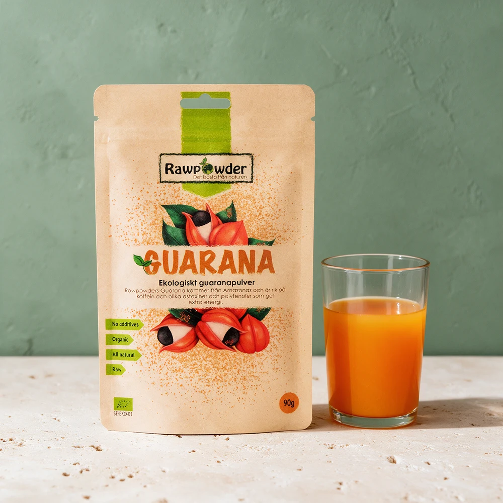 Rawpowder Økologisk Guaranapulver, pose på 90 g, ved et glass appelsinjuice