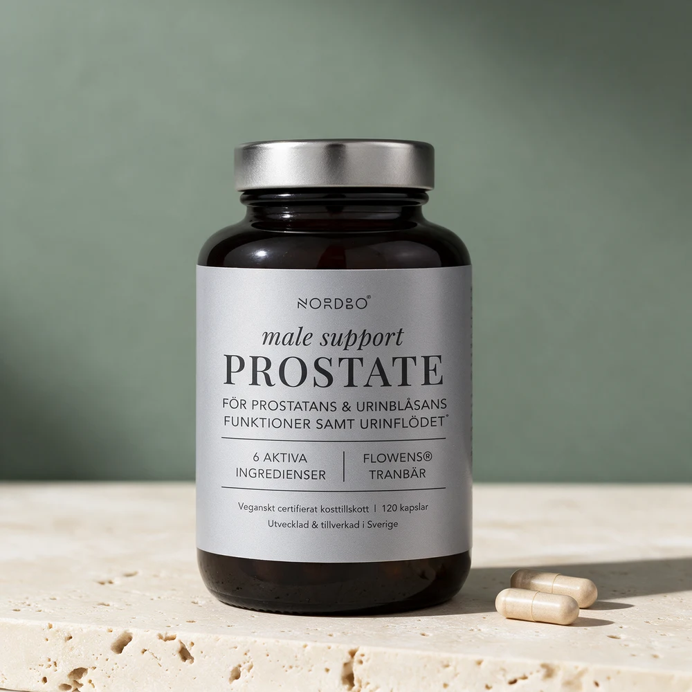 Nordbo Male Support Prostate i glasskrukken med to plantekapsler ved siden av