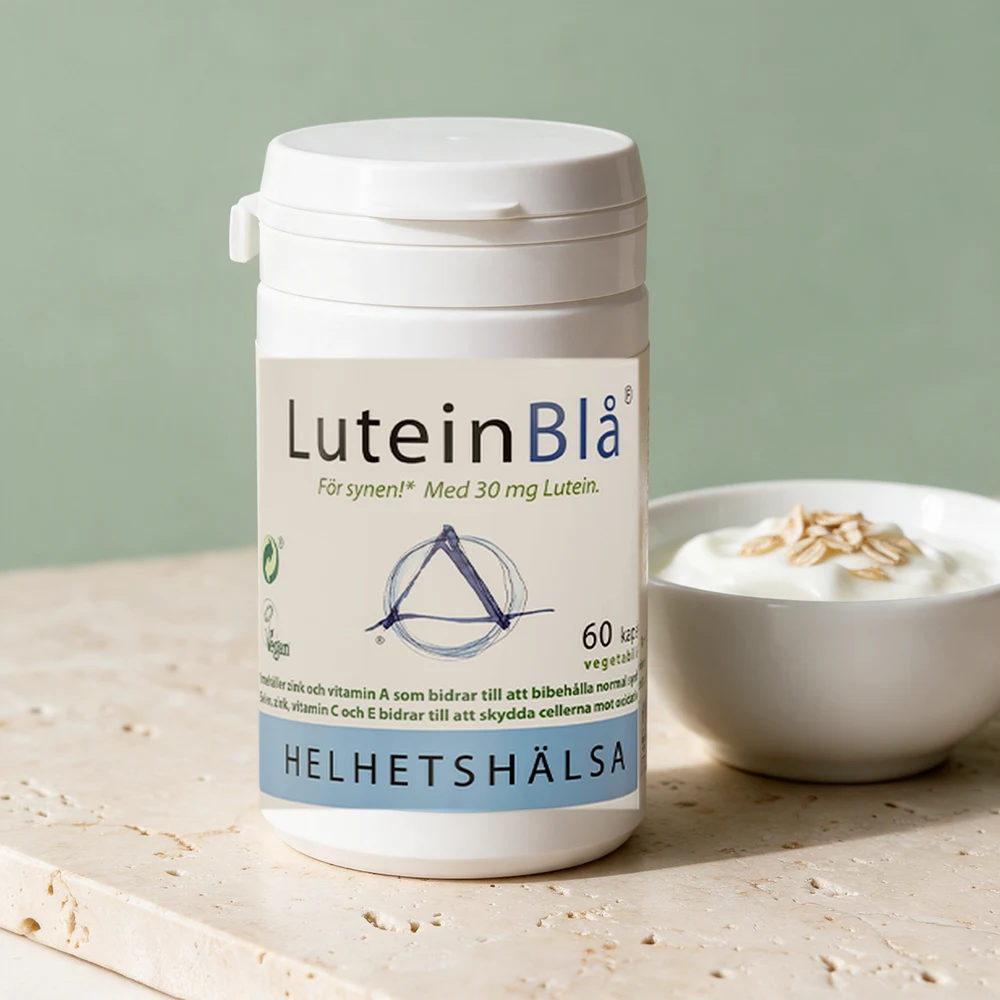 Helhetshälsa LuteinBlå, hvit boks merket «Med 30 mg Lutein»