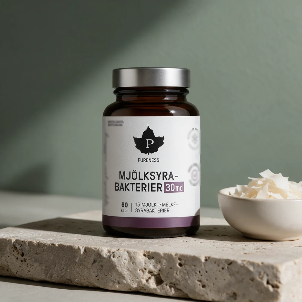 Pureness Mjölksyrabakterier 30 md, krukke med 60 kapsler, ved en skål kokosflak
