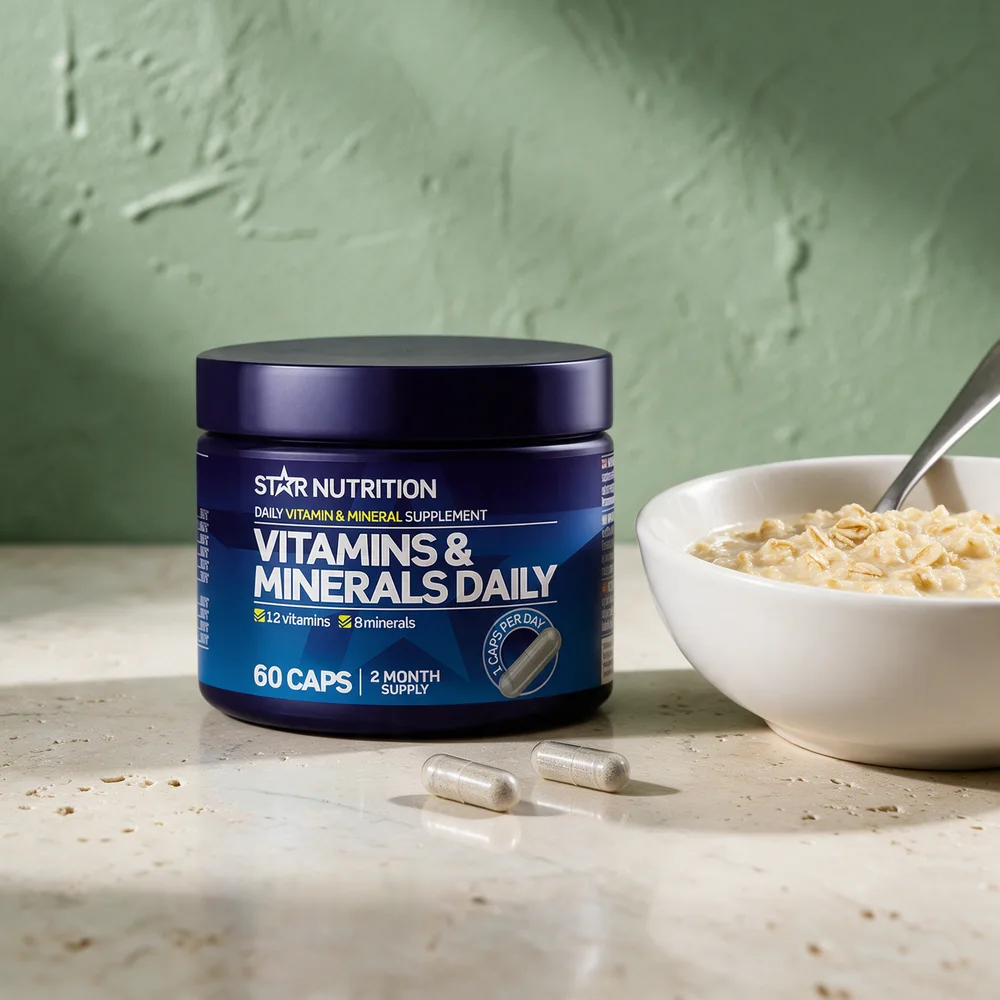 Star Nutrition Vitamins & Minerals Daily med to hvite kapsler foran boksen