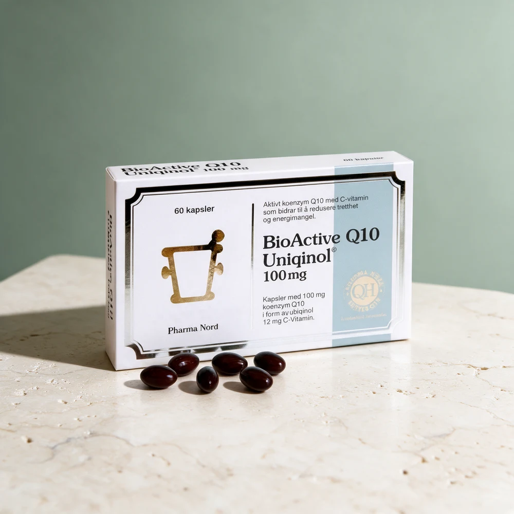 BioActive Q10 Uniqinol, hvit eske og seks mørke, myke kapsler foran