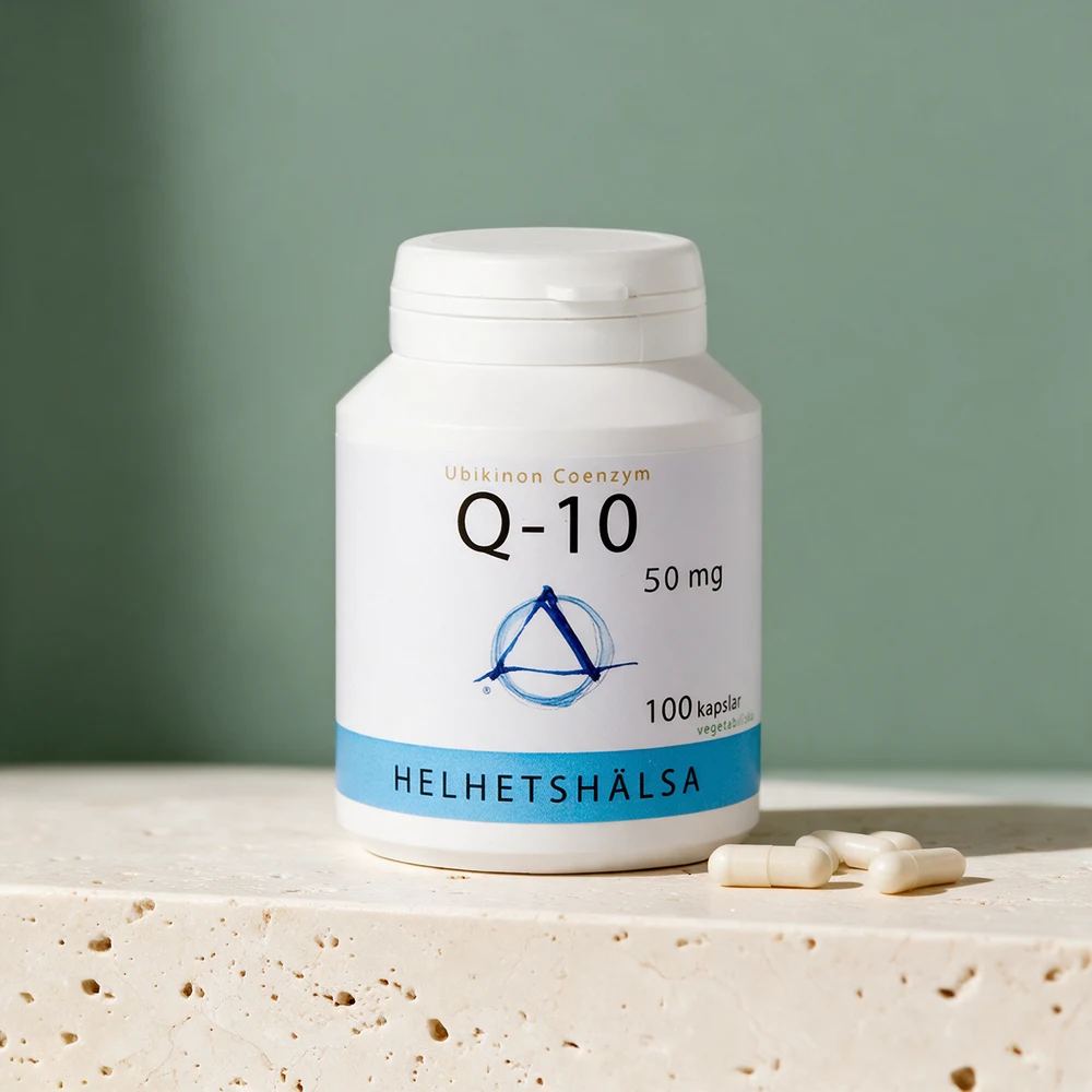 Helhetshälsa Q-10 50 mg, hvit boks med blå stripe og noen lyse kapsler