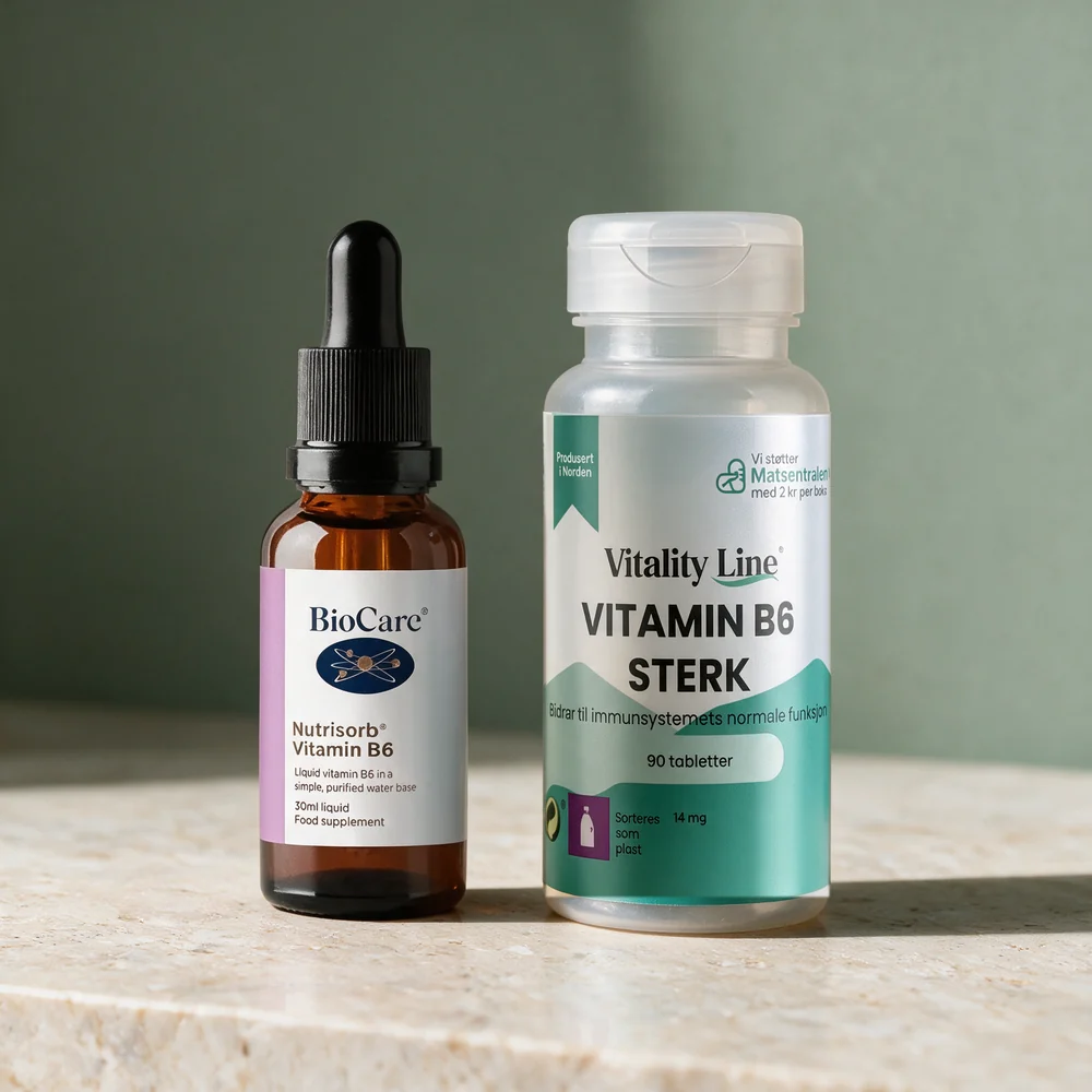 BioCare Nutrisorb Vitamin B6 i brun glassflaske med pipette og Vitality Line Vitamin B6 Sterk i halvgjennomsiktig plastboks på et travertinbord