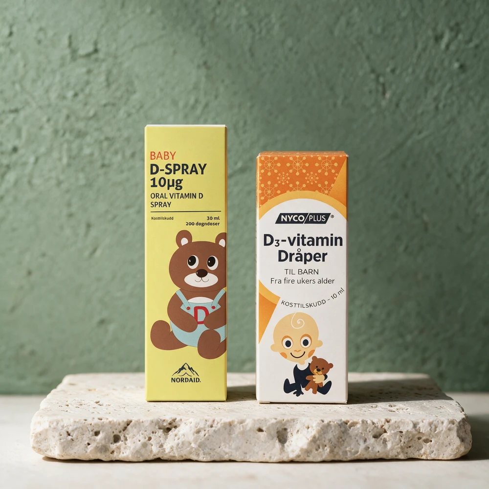 Eskene til Nordaid D-spray Baby og Nycoplus D3-vitamin dråper side om side på et travertinbord